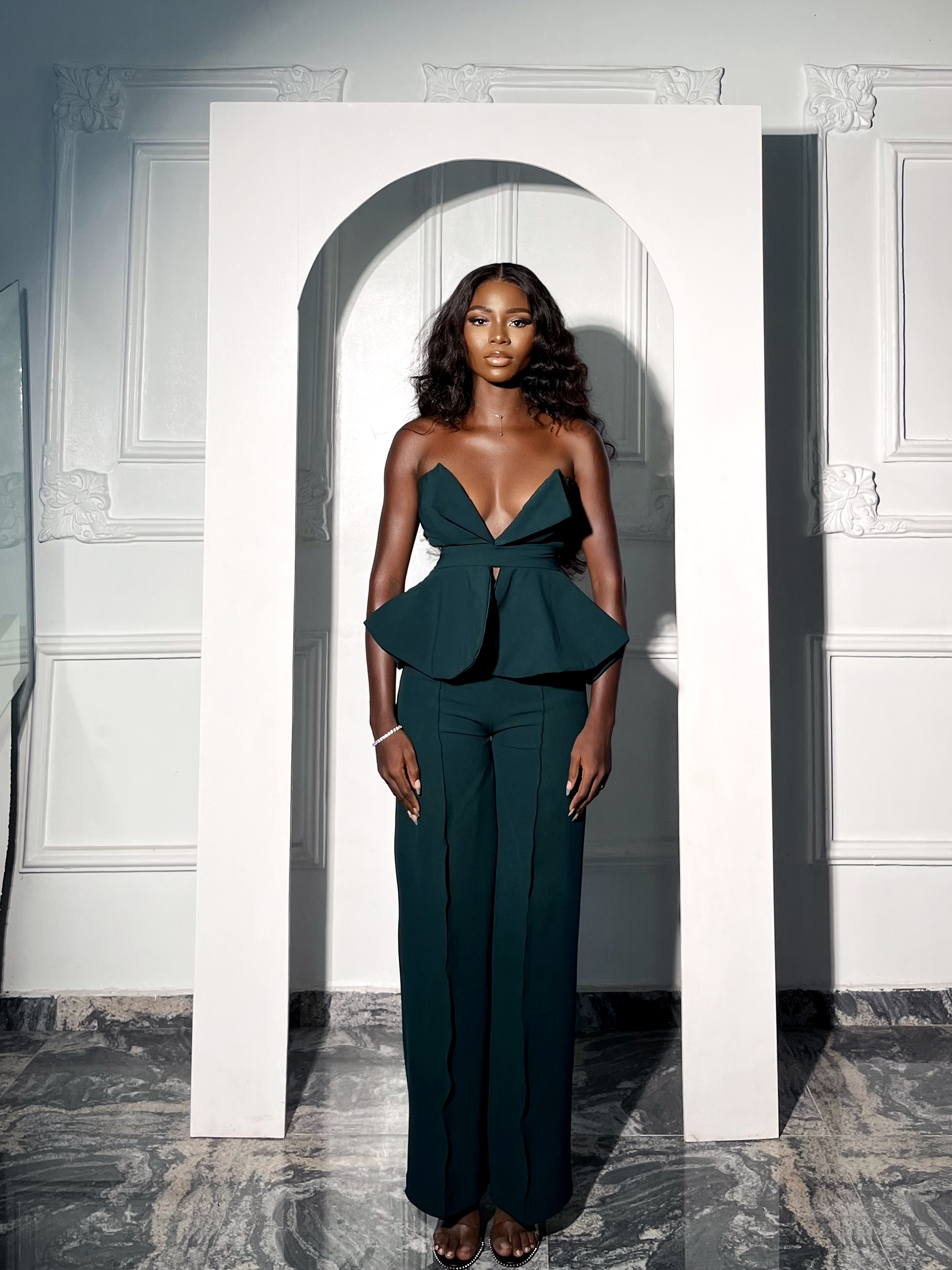 Diamond Cut Blazer editorial portrait beneath an arch